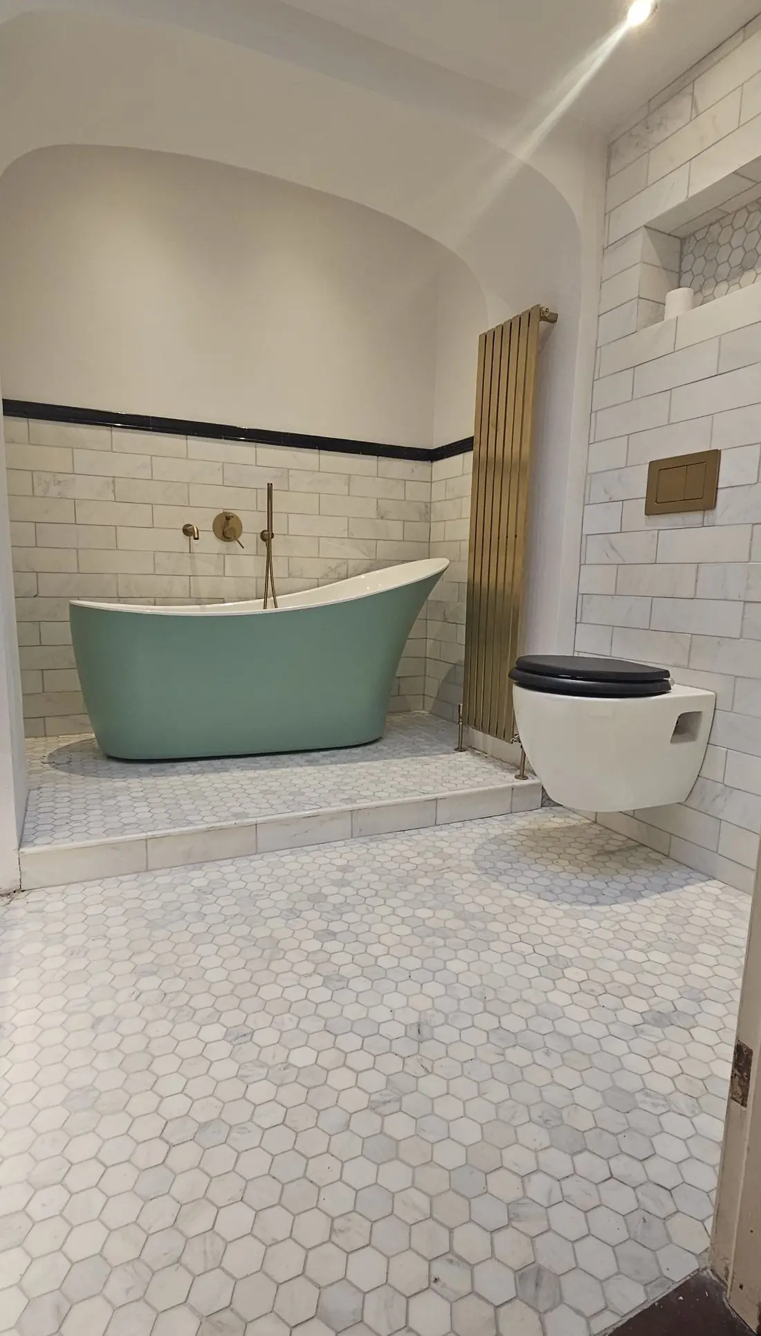 Green and white bathroom